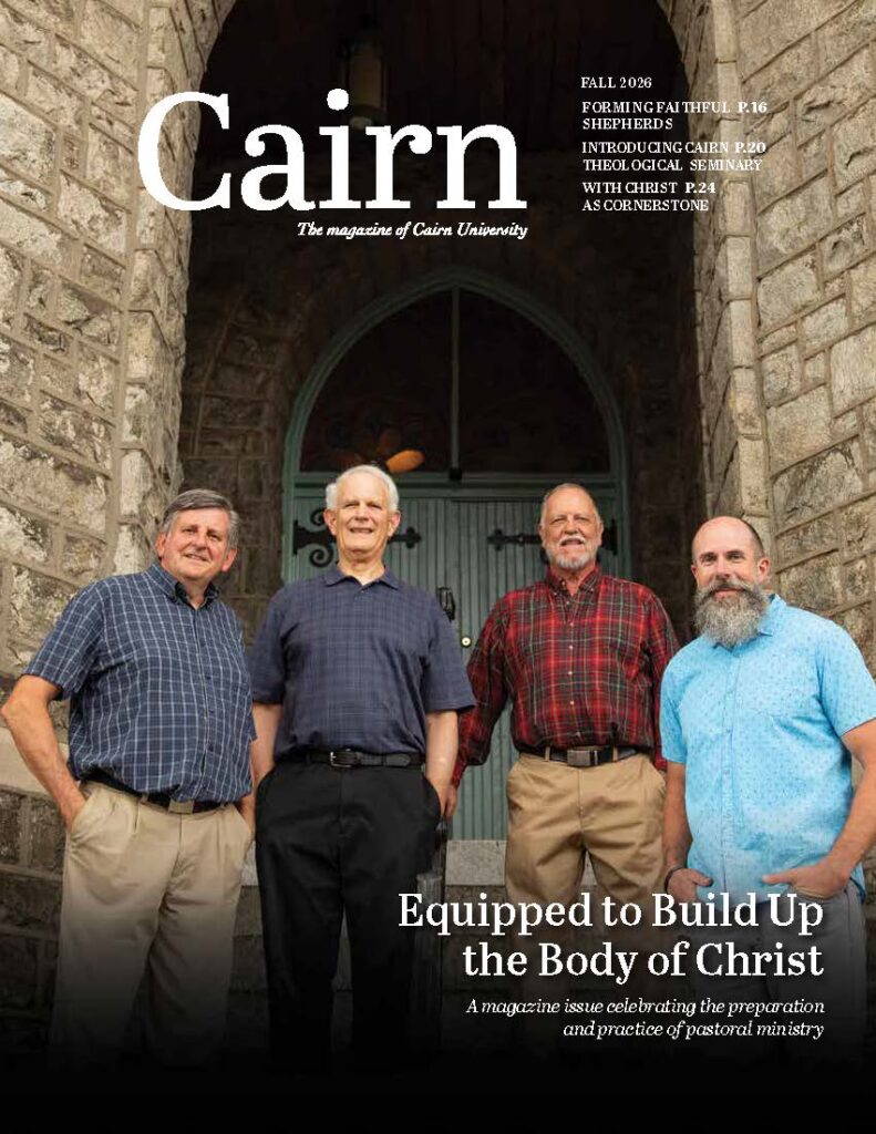 cover of Fall 2026 Cairn magazine, featuring a posed photo of four pastors on the steps of their church