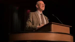 Seth McCoy at Chapel podium