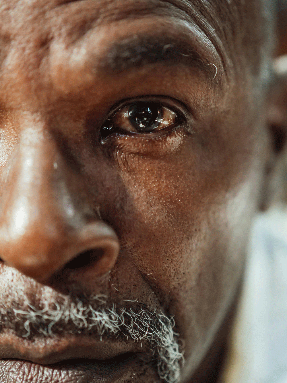 close up photo of half of a man's face