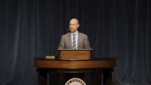Jared Bryant behind chapel podium