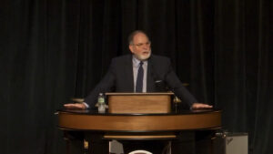 Todd Williams behind chapel podium