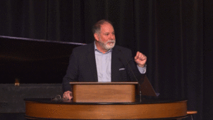 Todd Williams behind chapel podium