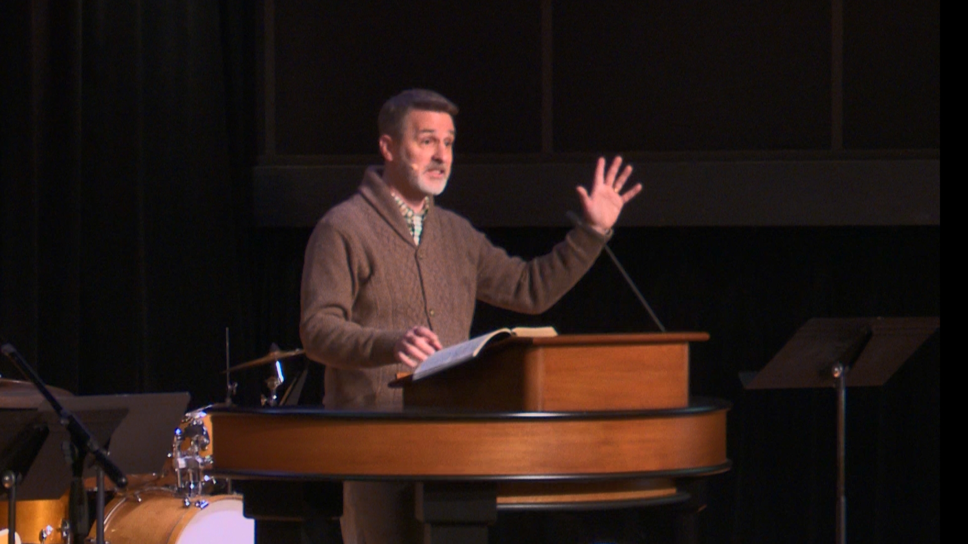 Robert Chisholm behind chapel podium