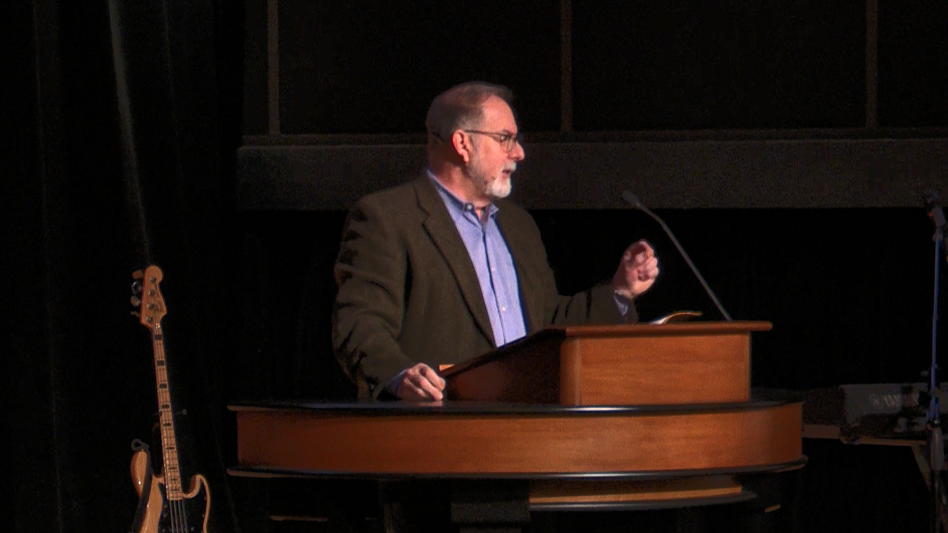 Todd Williams standing behind chapel podium