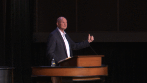 Josh Beers behind chapel podium