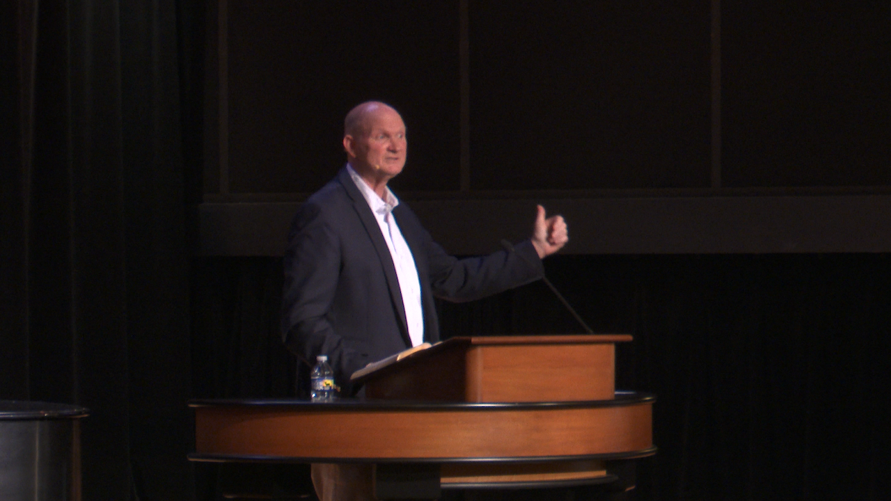 Josh Beers behind chapel podium