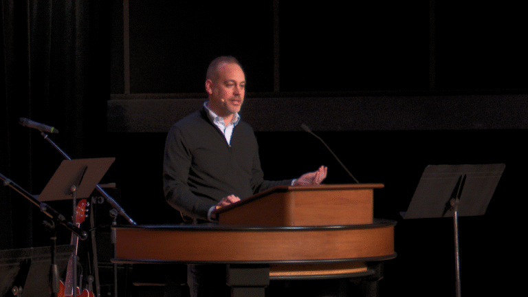 Kevin McFadden behind chapel podium