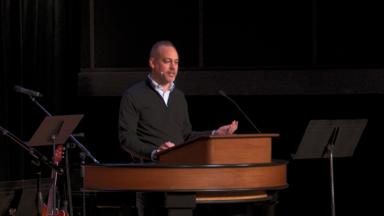 Kevin McFadden behind chapel podium