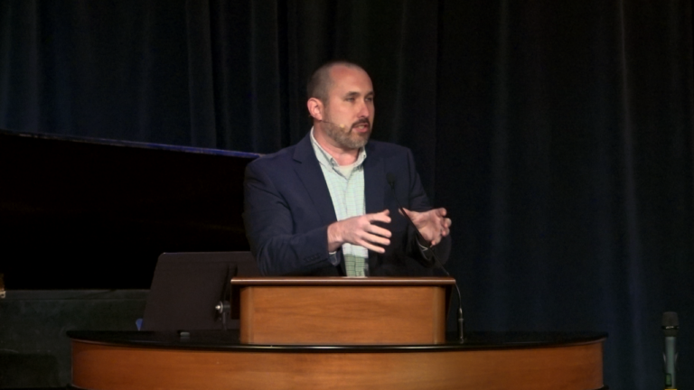 Bryan Murawski behind chapel podium