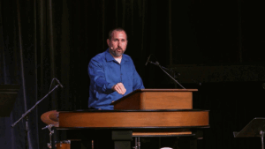 Dr. Bryan Murawski behind chapel podium