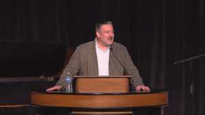 Jared Wilson behind chapel podium