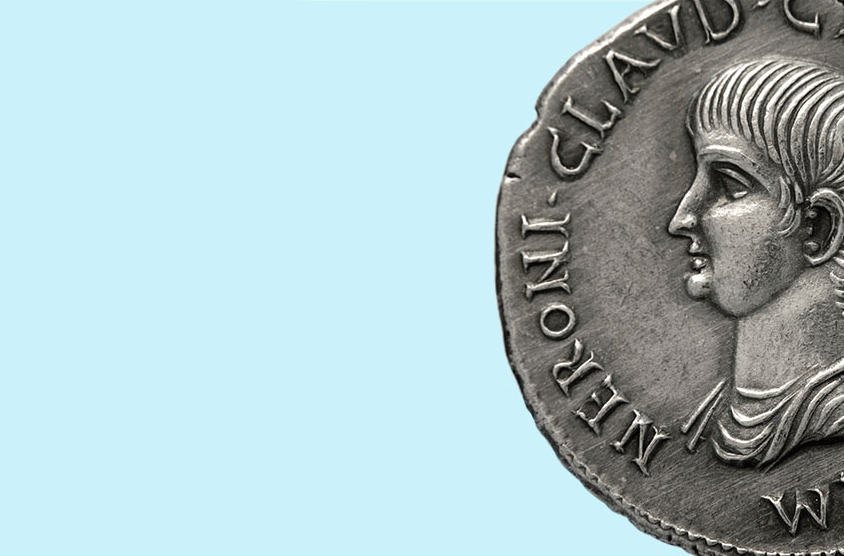 image of a roman coin on a blue background