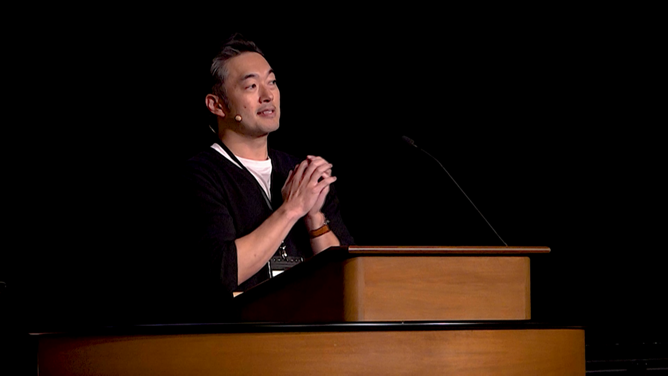 Sherwin Kwon behind chapel podium