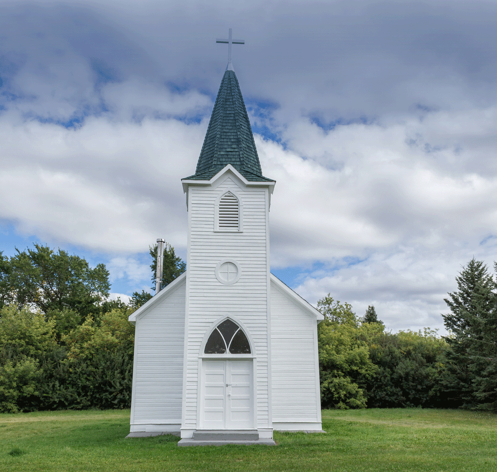image of a small white church building with a steeple